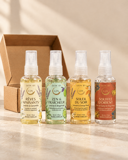 Les 4 brumes d'oreiller 30 ml Skin by L.D.S alignees devant leur boite cadeau kraft